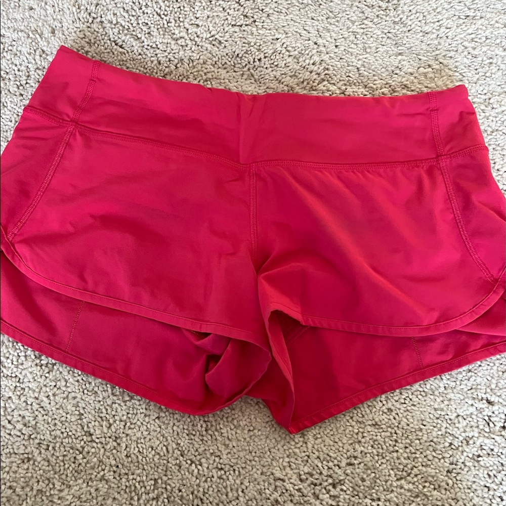 Dark pink lululemon shorts. Size 8. Worn 2x.